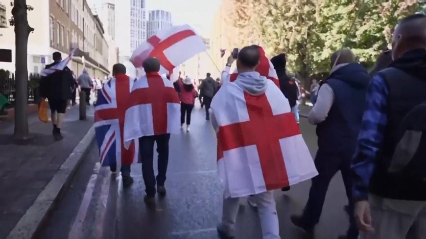 More than 100,000 people pack streets of central London in march organized by far-right activist