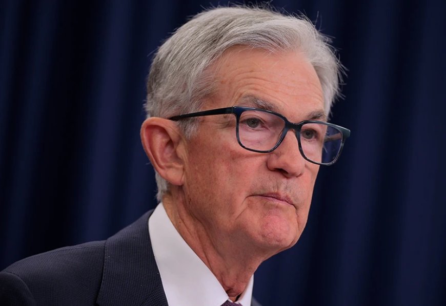 Federal Reserve cuts interest rates, suggests more reductions to come