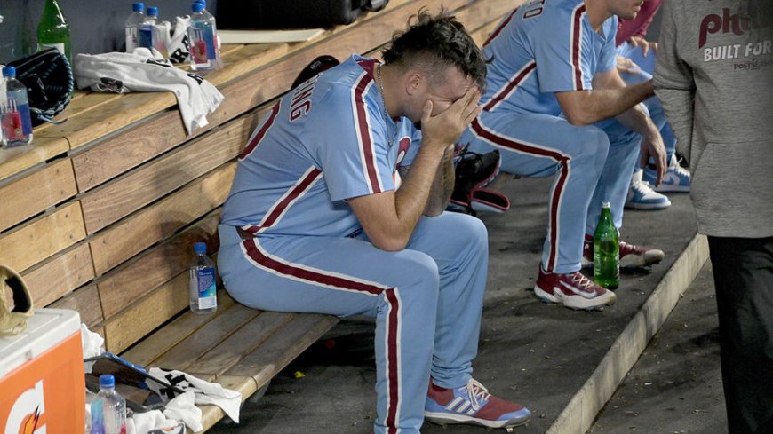 Phillies reliever calls his crushing season-ending error a 'horses--- throw'
