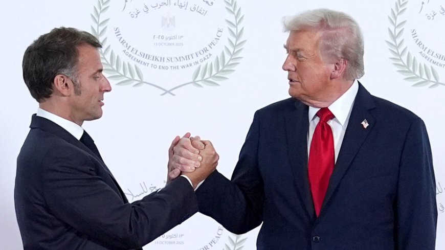Watch Trump and France's Macron share weirdly long 26-second marathon handshake