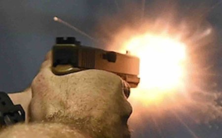 Thug forces his way into apartment, attacks elderly resident. But armed neighbor rushes over and permanently ends threat.