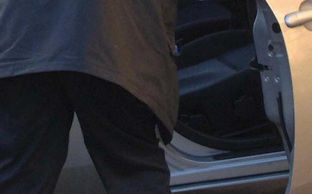 Video: Woman pulls male intruder out of her car, throws him to the ground with ease — while her amazed husband watches