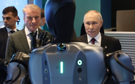Putin calls dancing Russian robot 'very beautiful' in awkward AI conference moment