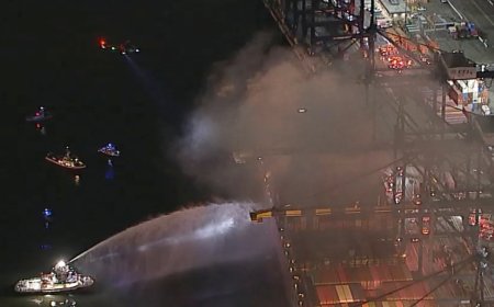 LA firefighters battle blaze that sparked explosion on container ship carrying hazardous materials