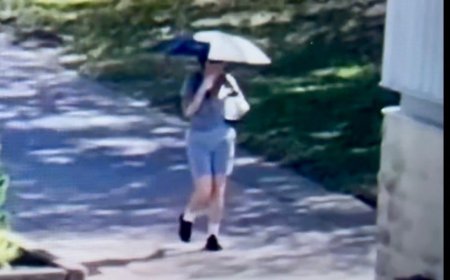 Ghislaine Maxwell filmed bizarrely carrying umbrella on sunny day at Texas prison: video