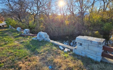 Two rescued after car found upside-down in Brush Creek in Kansas City