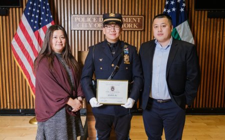NYPD cop gets touching unexpected surprise from two special fans at promotion
