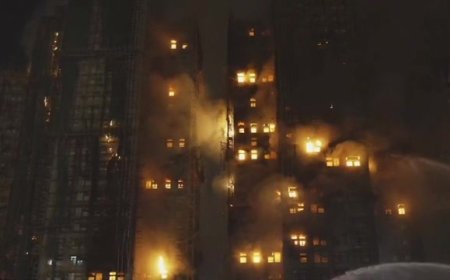 Death toll in Hong Kong apartment complex blaze rises to 146 as the city mourns