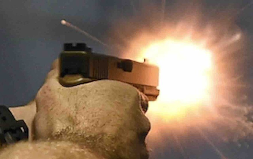 Thug forces his way into apartment, attacks elderly resident. But armed neighbor rushes over and permanently ends threat.