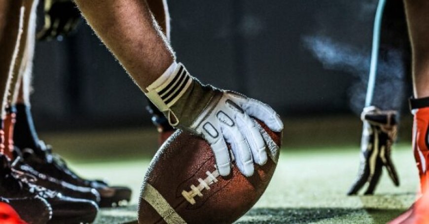 WATCH: High School Coach Shoves Opposing QB, Sparks Sideline Brawl