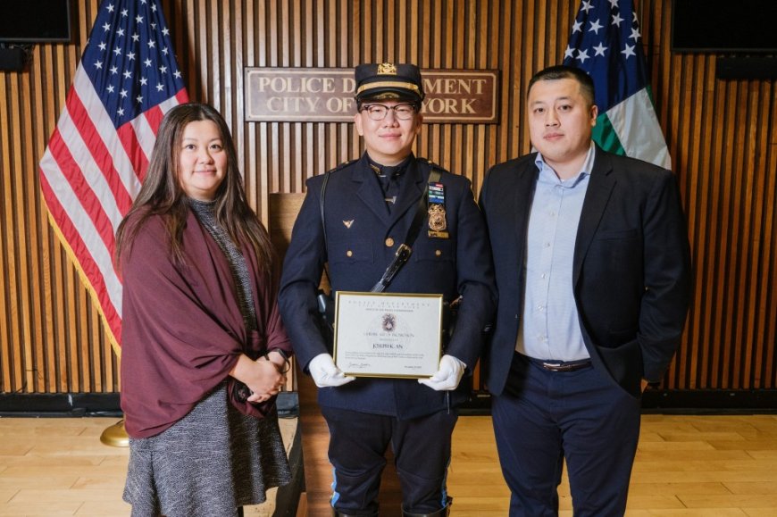 NYPD cop gets touching unexpected surprise from two special fans at promotion